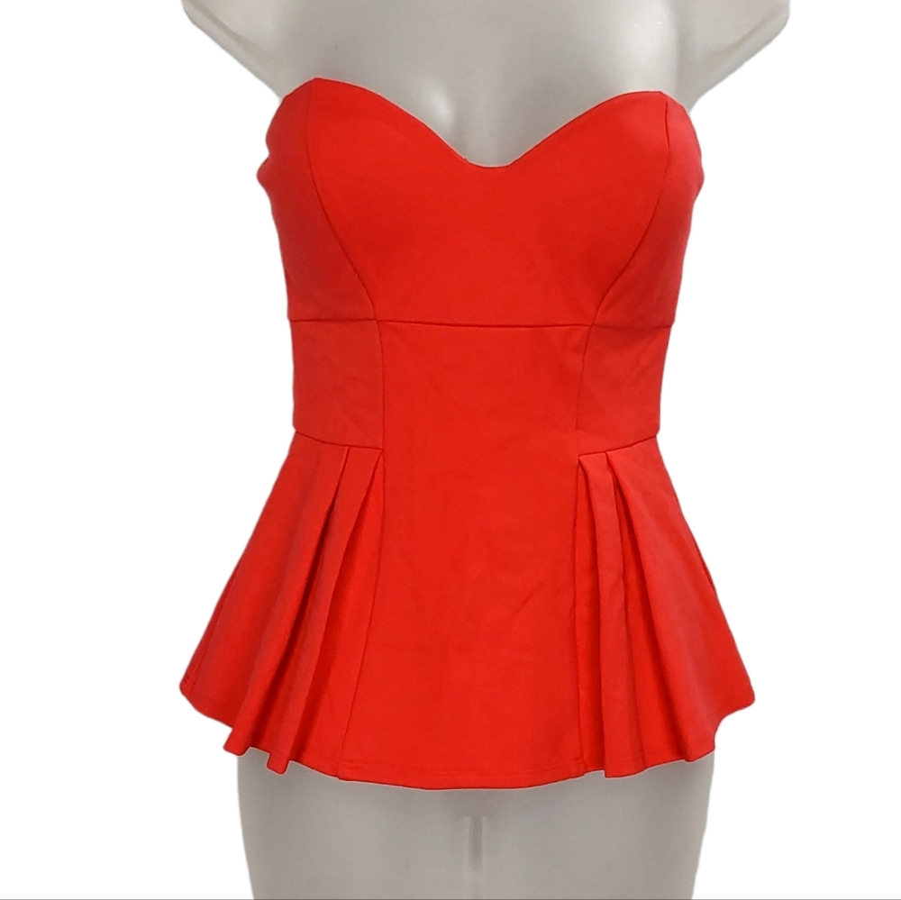 Bebe Strapless peplum top